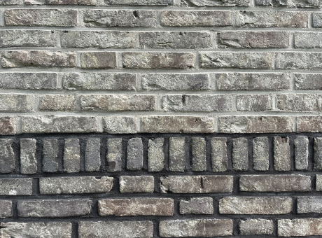 Gevelsteen HV gesmoord